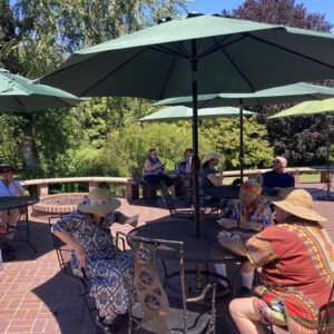 Guest sitting on the terrace at Menucha's Open House